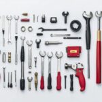 organized collection various hand tools equipment white background